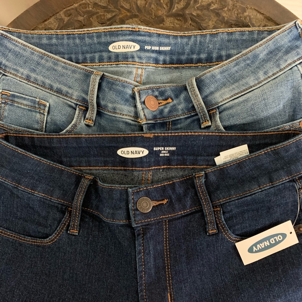 2 pair of old navy jeans, one dark pair, one light pair. Straight leg/skinny